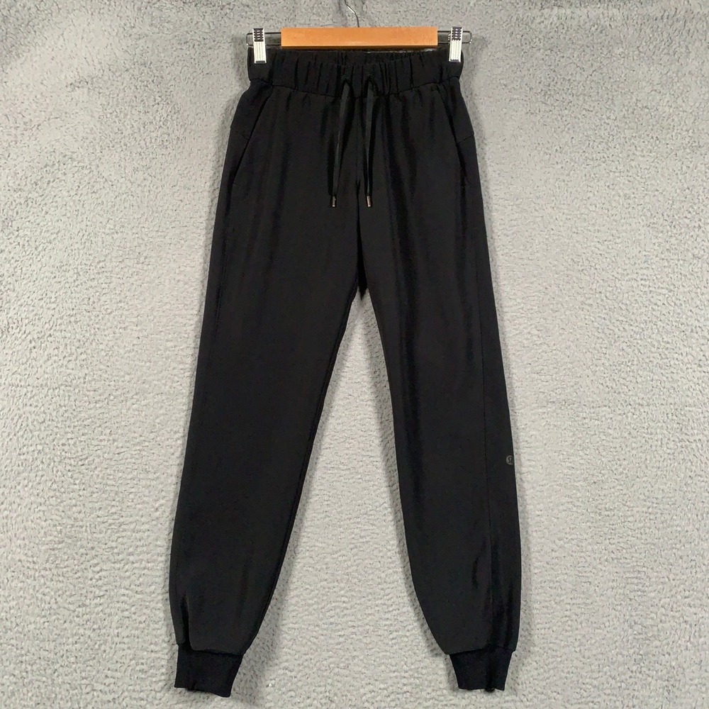 Lululemon On the Fly Jogger Pants Women's 0 Black Active Travel Casual Tapered